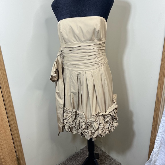 BCBGMaxAzria Dresses & Skirts - BCBGMaxAzria Strapless Tan Dress with Ruffle Detail
